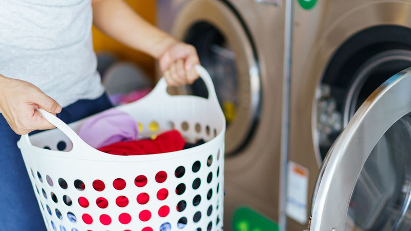 Putting dirty clothes in the washing machine—What are natural static cling reducers?